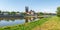 Panoramic view of Magnificent Cathedral of Magdeburg and river Elbe at Summer in Magdeburg, Germany, at sunny day and blue sky