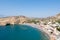 Panoramic view of Matala sandy beach with caves near Heraklion town on Crete, Greece