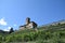 Panoramic view of the medieval castle of Sarre and its agricultural estate cultivated with vineyards - Italy