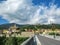 Panoramic view of the medieval fortified town with church of Saint-Juste-et-Sainte-Ruffine, Fort Lagarde and mountains, southern