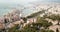 Panoramic view of Mediterranean coastal city of Malaga with harbor, Spain