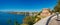 Panoramic view of Mediterranean seacoast, mountains, beach and resort hotels, ancient fortress and observation binocular at