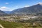 Panoramic view of Merano in Italy with mountains in background.