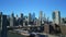 Panoramic view of metropolis, Brooklyn Bridge, transport infrastructure and iconic Manhattan skyscrapers. New York City