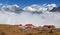 Panoramic view Mount Everest Lhotse and Ama Dablam from Kongde with tourist lodge and beautiful clouds, Sagarmatha national