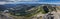 A panoramic view from the mountain Brecherspitze into the Bavarian Alps. To the left lake Spitzingsee, Germany