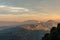 Panoramic view of mountain landscape on sunset. Last sun beams at the tops of the mountains near Monastery of Montserrat, Spain