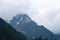 Panoramic view of the mountain peaks of the Caucasus, high mountains above the clouds