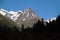 Panoramic view of the mountain peaks of the Caucasus, high mountains above the clouds