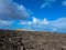 Panoramic view of mountain range with volcanoes in Timanfaya National Park, Lanzarote, Canary Islands, Spain, Europe