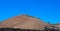 Panoramic view of mountain range with volcanoes in Timanfaya National Park, Lanzarote, Canary Islands, Spain, Europe