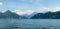 Panoramic view into the mountains on a boat cruise on lake lucerne end of spring