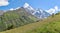 Panoramic view of the mountains from the gently sloping hill