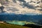 Panoramic view of mountains from Schafberg peak in Salzkammergut, Austria in a summer day with dramatic clouds and Wolfgangsee