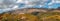 Panoramic view of the mountains of Serrania de Ronda and the chestnut forest in autumn. Trekking route, scenic, around the