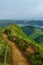 Panoramic view of natural landscape in the Azores, wonderful island of Portugal. Beautiful lagoons in volcanic craters and green f