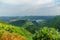 Panoramic view of natural landscape in the Azores, wonderful island of Portugal. Beautiful lagoons in volcanic craters and green f