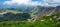 Panoramic view from Nebelhorn in Oberstdorf AllgÃ¤u Bavaria Germany - Beautiful Alps with lush green meadow and blue sky -