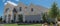 Panoramic view new single-family house with nice trim front yard near Dallas, Texas