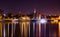 Panoramic view of Night Wroclaw City, Odra river and reflections of historical buildings in it.