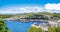 A panoramic view of Oban on the west coast of Scotland, showing the town, ferry terminals and hills in  the background, taken on a