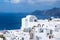 Panoramic view of Oia town cityscape at Santorini island in Greece. Traditional white houses. Greece, Aegean sea. Famous European