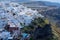Panoramic view of Oia town cityscape at Santorini island in Greece. Traditional white houses. Greece, Aegean sea. Famous European