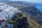 Panoramic view of Oia town cityscape at Santorini island in Greece. Traditional white houses. Greece, Aegean sea. Famous European