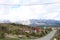 Panoramic view with old rural houses from the beautiful green plateau of Zabljak mountain