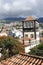 Panoramic view of the old town of Funchal, Madeira island, Portugal with red tile roofs and historical buildings