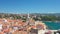 Panoramic view of the old town of Krk in Croatia, cathedral tower and seascape in background