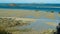 Panoramic view over bay during low tide in atlantic ocean with small islands and blue slightly dizzy sky- Dinard, Bretagne, France