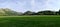 Panoramic view over fields to Hartsop area, Lake District