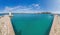 Panoramic view over the harbor of the Croatian coastal town of Novigrad in Istria during the day when the weather is