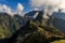 Panoramic view over the Inca old temple city of Machu Picchu surrounded by a group of clouds