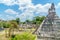 Panoramic view over Maya pyramids and temples in national park Tikal in Guatemala