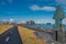 Panoramic view over Reykjavik downtown, embankment, ocean and bicycle lane, at sunny day and blue sky, summer