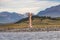 Panoramic view over a rookery of King Cormorants at Beagle Channel islands with a lighthouse in Patagonia, near Ushuaia, Argentina