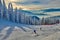 Panoramic view over the ski slope, ski resort in Transylvania, Pine forest covered in snow on winter season,Mountain landscape in