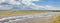 Panoramic view over Snowdonia Peaks from Dunes of Anglesey