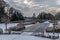 Panoramic view over the Stuyvenberg city park with frozen ponds, snowy reeds and meadows, Laeken, Belgium