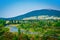 Panoramic view over Tongariro river delta with magnificent mountains at the horizon.