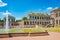 Panoramic view over Zwinger palace, gardens and fountains with many tourists at historical and museums downtown of Dresden,