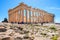 Panoramic view of Parthenon - temple of goddess Athena - within ancient Athenian Acropolis complex atop Acropolis hill in Athens,