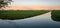 Panoramic view of peaceful countryside in western part of Holland at sunrise