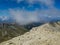 Panoramic view of the peak of Monte Corvo with fog in the summer season