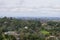 Panoramic view of the Peninsula on a cloudy day; view towards Los Altos, Palo Alto, Menlo Park, Silicon Valley and Dumbarton