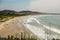 panoramic view of Pero beach in Arraial do Cabo, Brazil, at cloudy day
