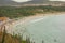 panoramic view of Pero beach in Arraial do Cabo, Brazil, at cloudy day