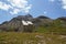 Panoramic view of `Pforzheimer HÃ¼tte`, a former alpine shelter in Sesvenna mountain range with peak FÃ¶llakopf